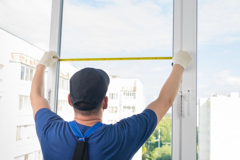 Professional Window Installer at Work